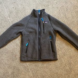 This is youth large dark grey Patagonia jacket.